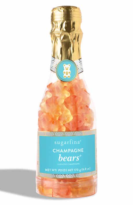 Sugarfina Champagne Bears in a champagne bottle display for an elegant gift
